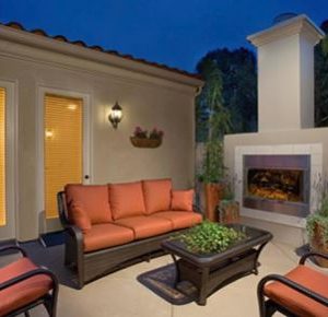 Newport Senior Living LLC I - 4 - patio fireplace.JPG