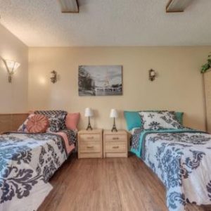 Crescent Landing at Garden Grove Memory Care apartment shared room.JPG