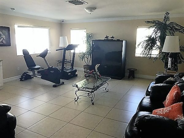 Golden Breeze Manor 3 - exercise and tv room 2.JPG