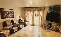 living-the-dream-care-home-3-living-room.jpg